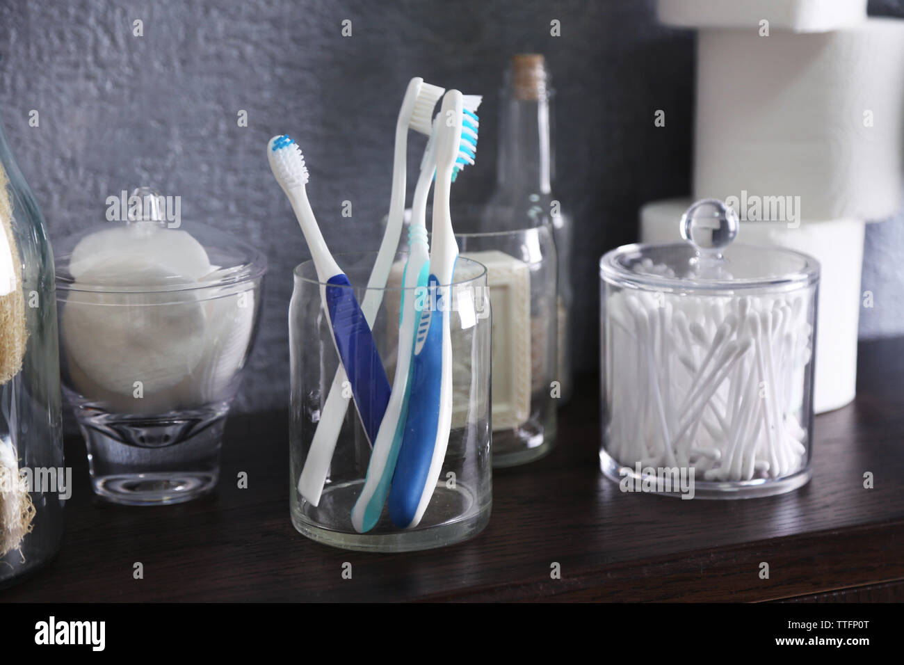 Bath accessories on grey wall background Stock Photo - Alamy