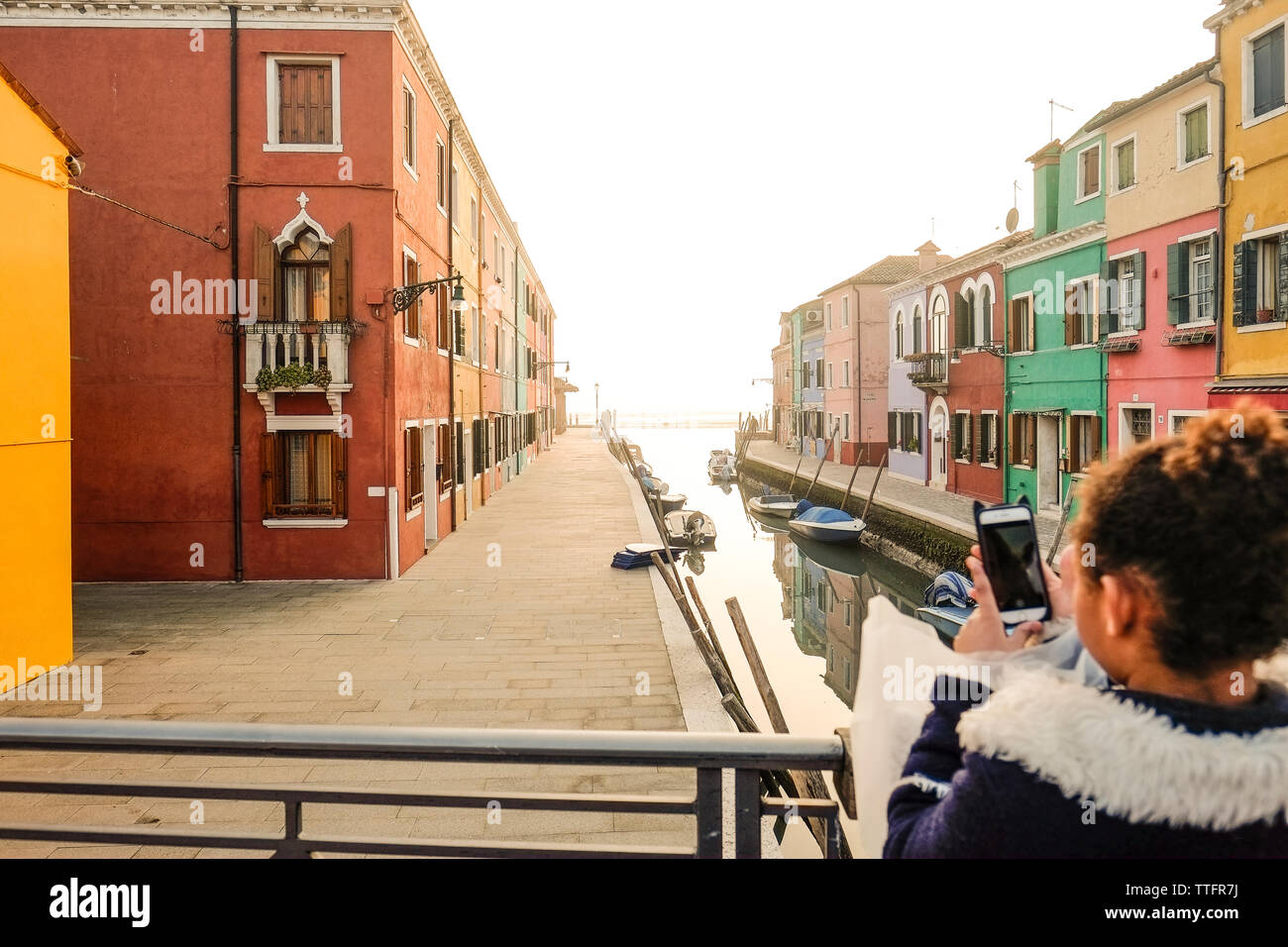 tourists taking pictures in Burano, Venice, Italy Stock Photo