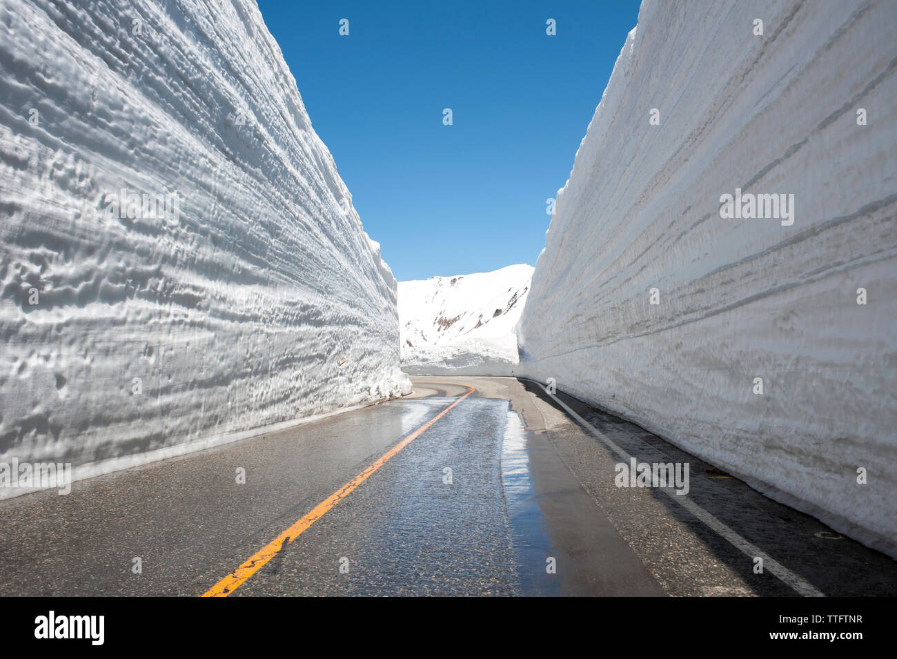Tateyama Kurobe Alpine Route against clear sky during winter Stock Photo