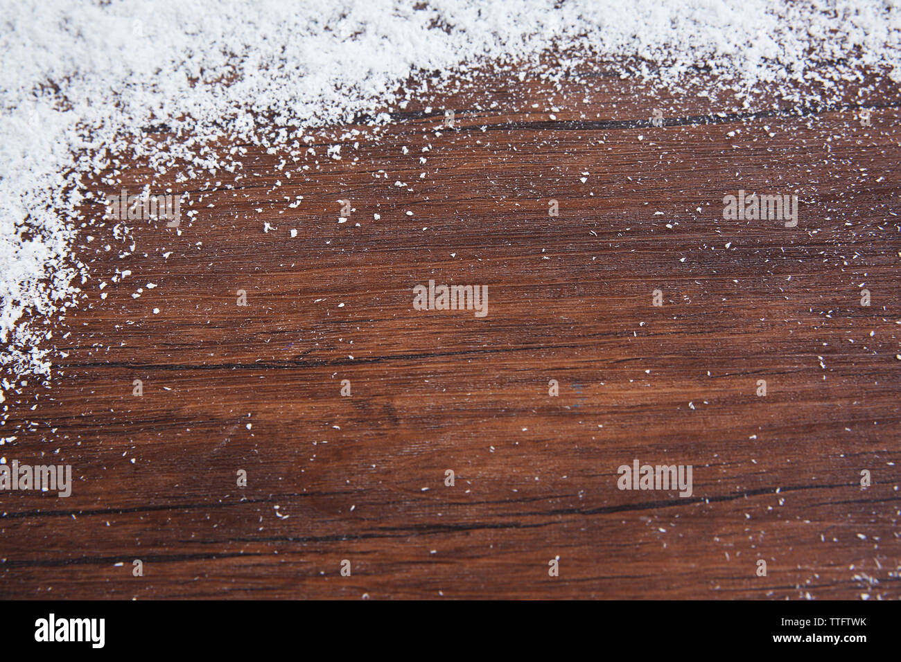 Snowy brown wooden background Stock Photo