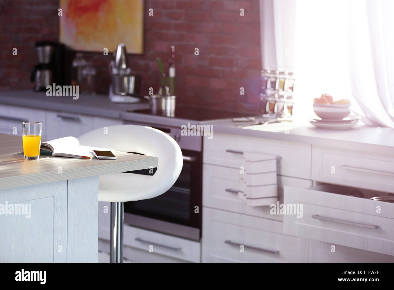 Modern kitchen interior with white furniture and electric stove Stock ...