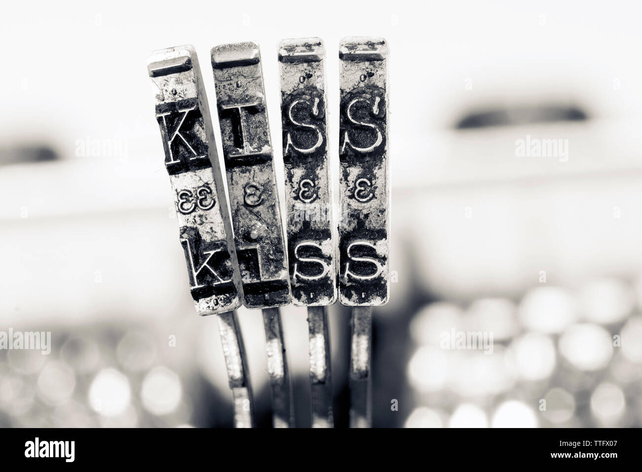 The word KISS with old typewriter in monochrome Stock Photo Alamy