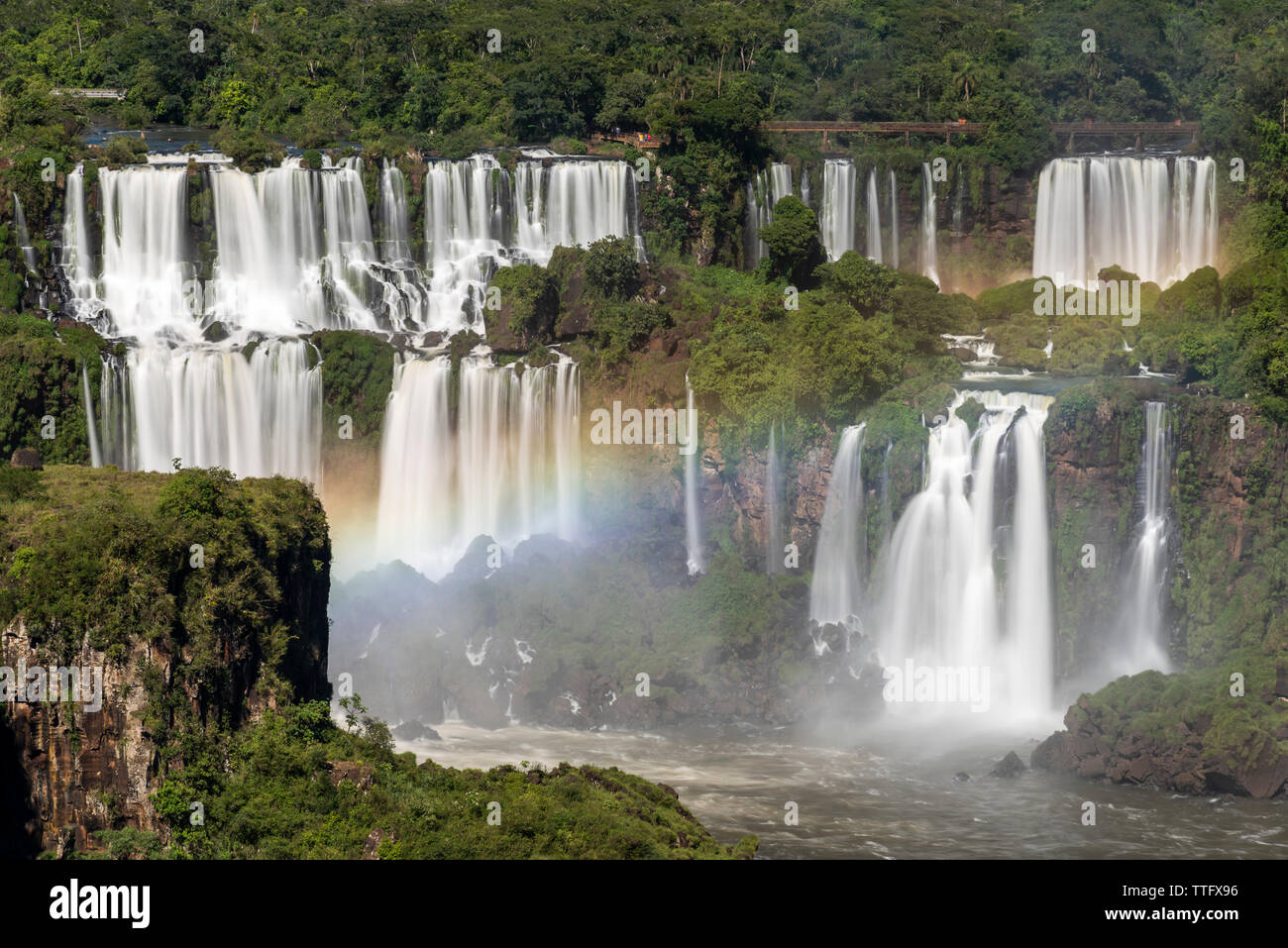 Beautiful landscape of rainbow and big waterfalls in the rainforest Stock Photo