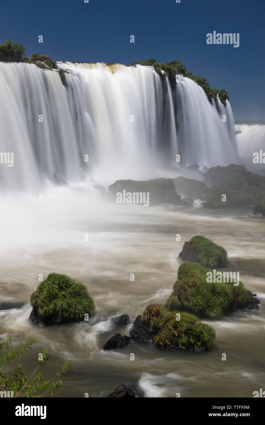 Beautiful landscape of big waterfall set on green atlantic rainforest Stock Photo