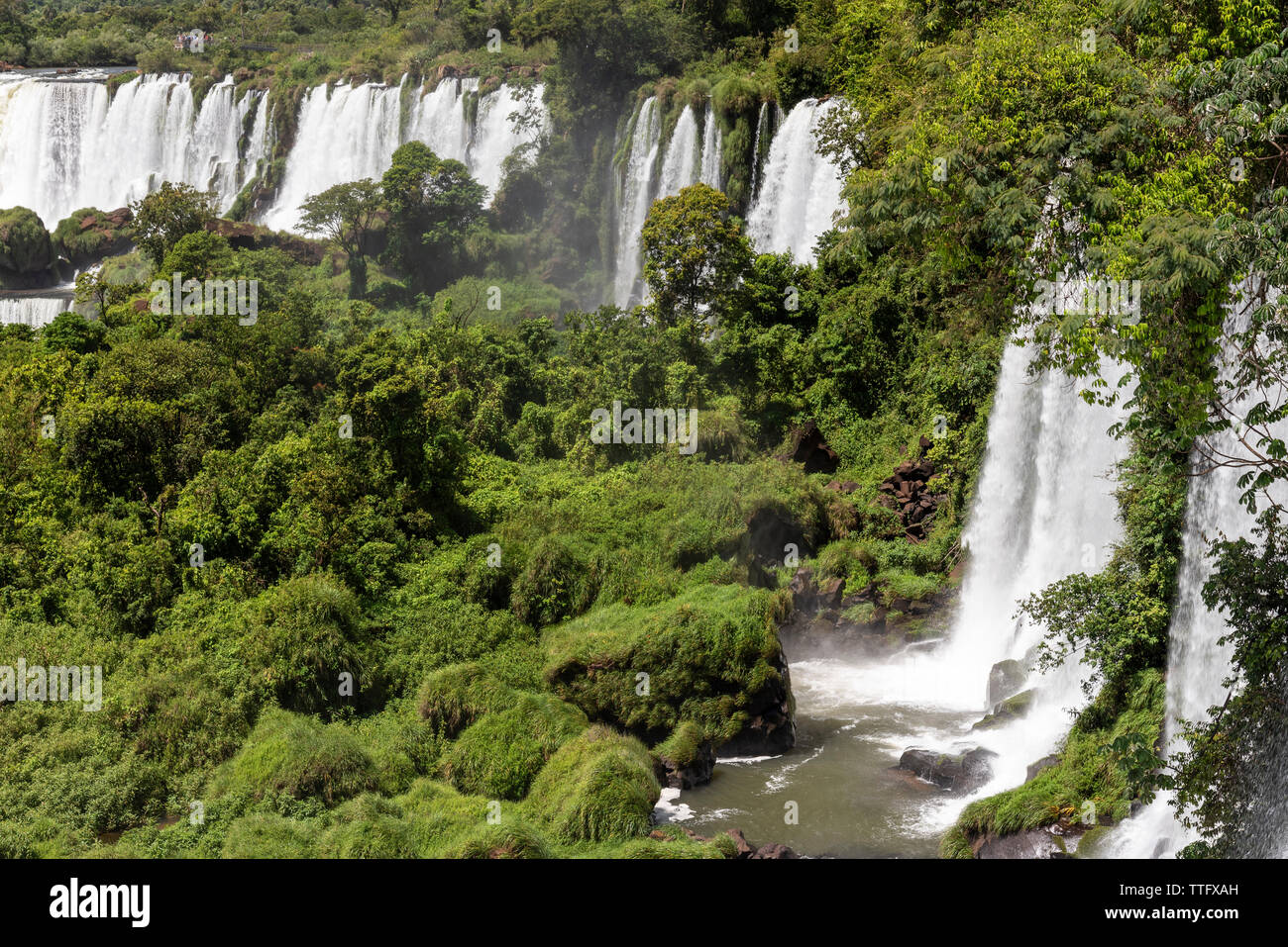 Beautiful landscape of big waterfall set on green atlantic rainforest Stock Photo