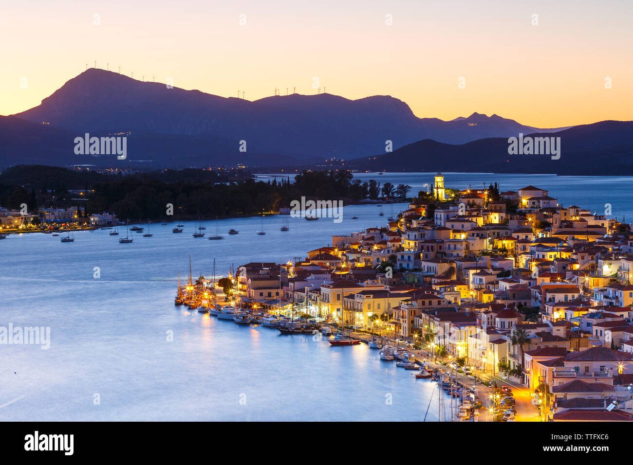 View of Poros island and mountains of Peloponnese peninsula in Greece. Stock Photo