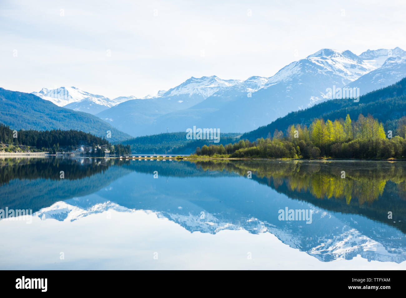 Mountain and Lake Reflection in Whistler British Columbia Canada Stock Photo