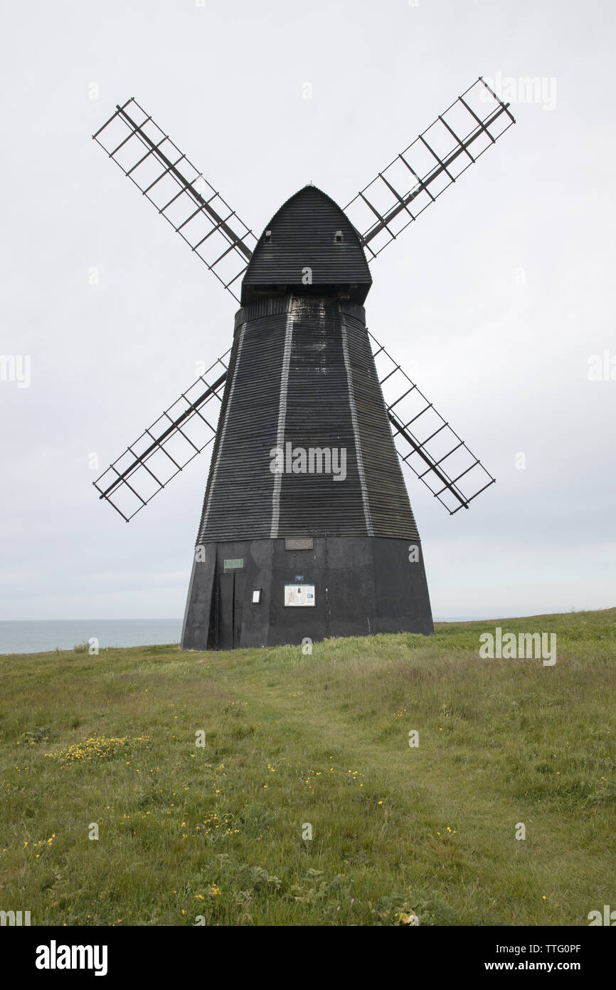 the windmill above the village of rottingdean in east sussex Stock Photo