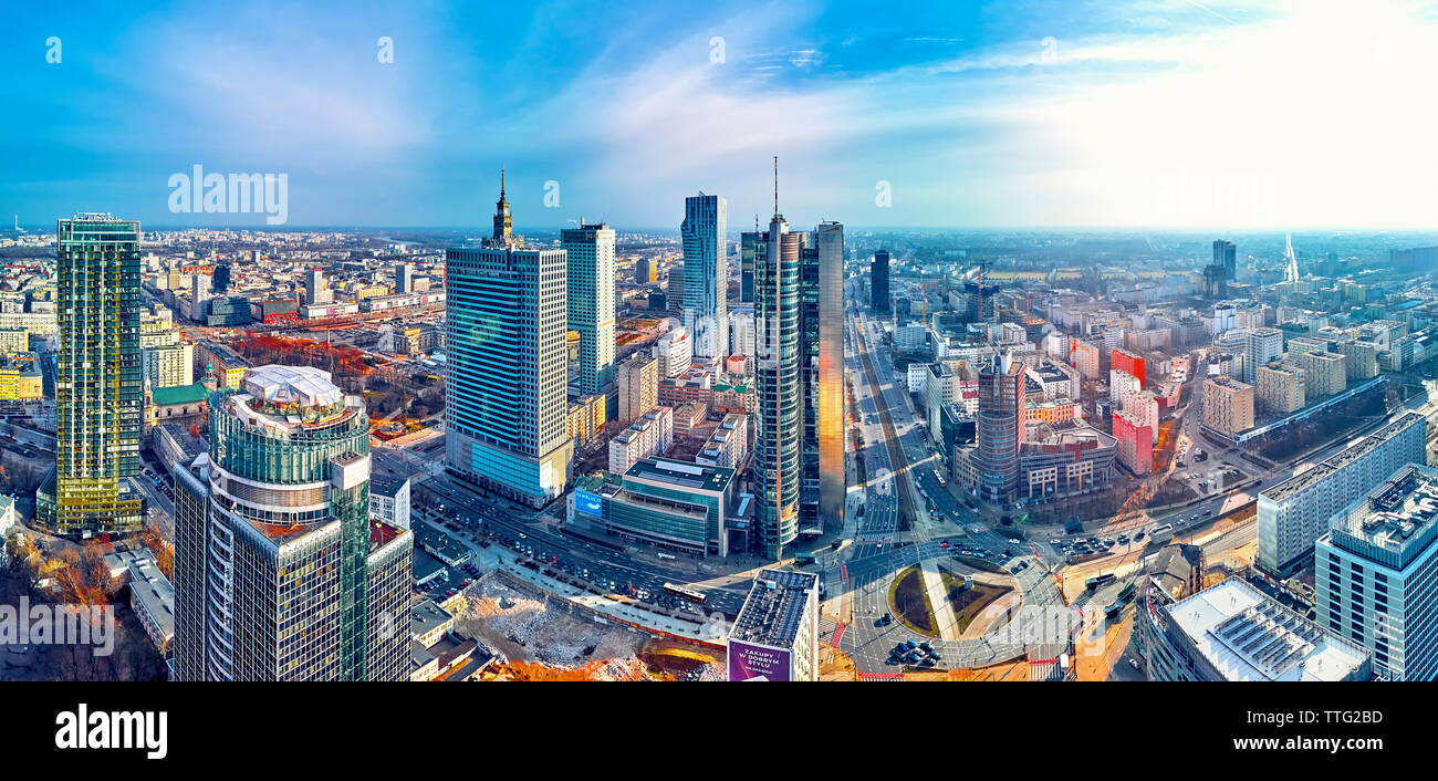 Beautiful panoramic aerial drone view to panorama cityscape of Warsaw modern City, PKiN and 'Rondo 1' office skyscraper located at Rondo ONZ Stock Photo