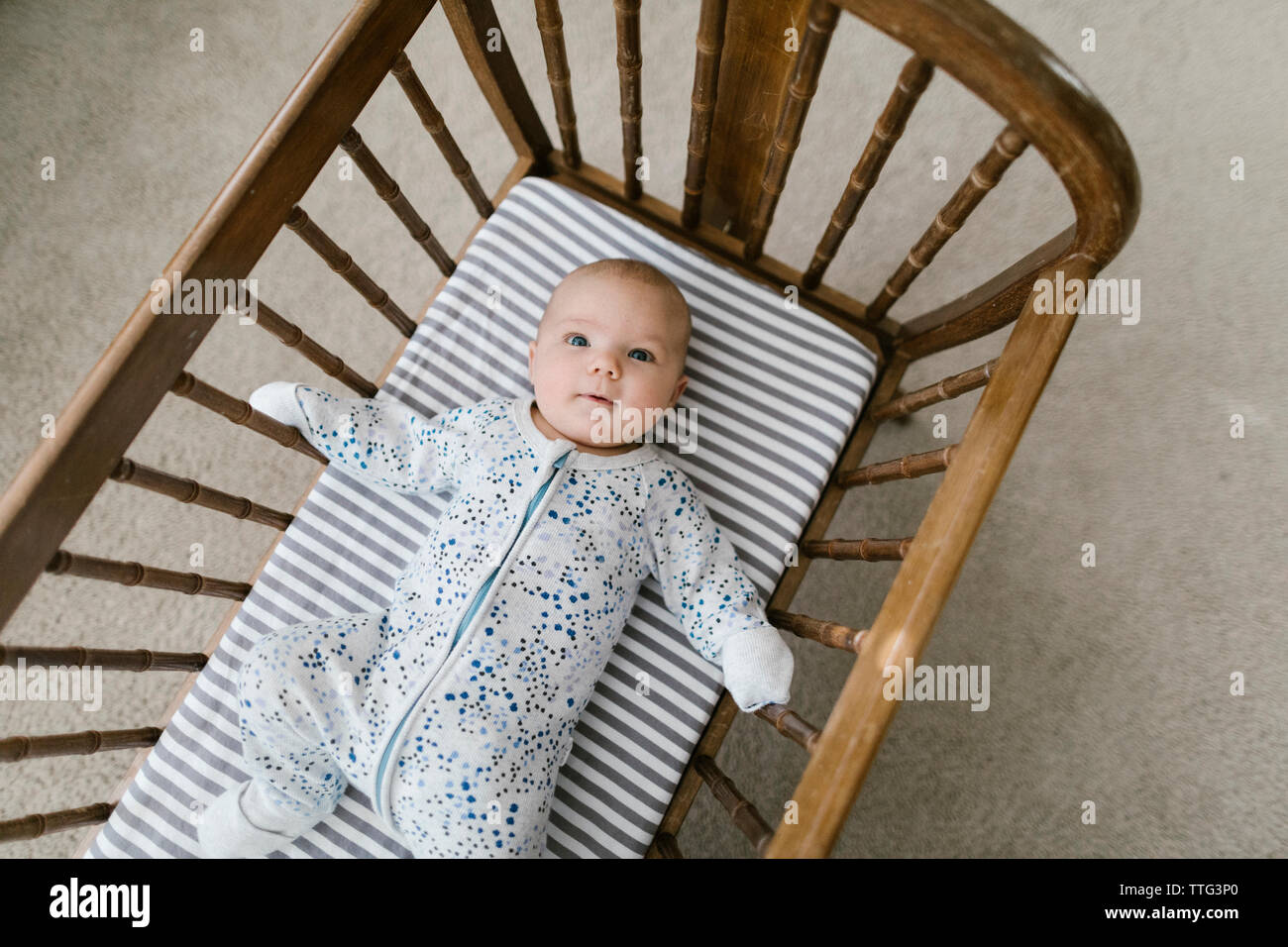 Cradle baby hi-res stock photography and images - Alamy