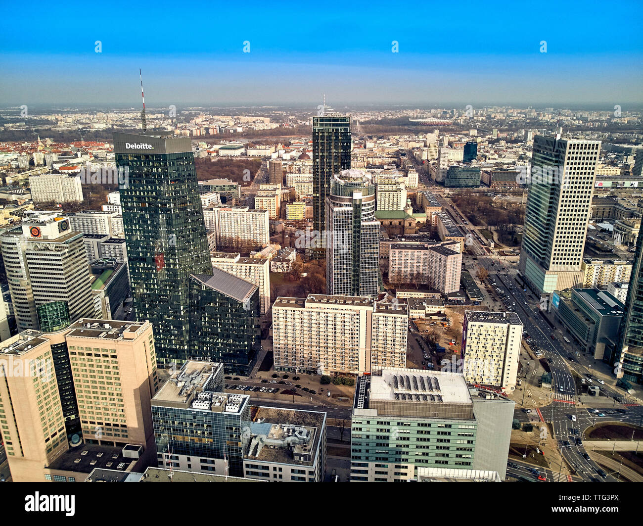 Beautiful panoramic aerial drone view to panorama cityscape of Warsaw modern City, PKiN and 'Rondo 1' office skyscraper located at Rondo ONZ Stock Photo