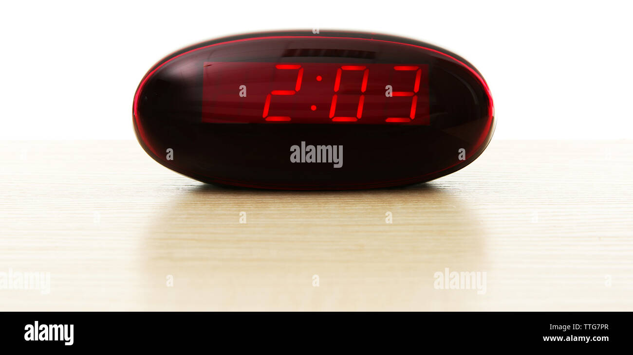 Digital clock isolated on white Stock Photo - Alamy