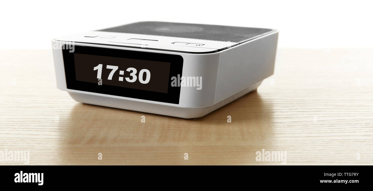 Digital clock isolated on white Stock Photo - Alamy