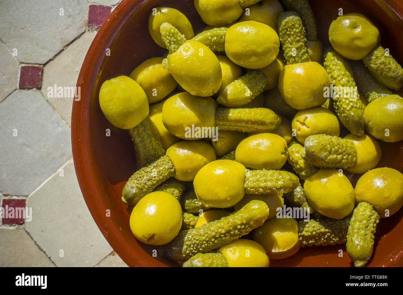 Olives and gherkins pickled snack tapas hires stock photography and