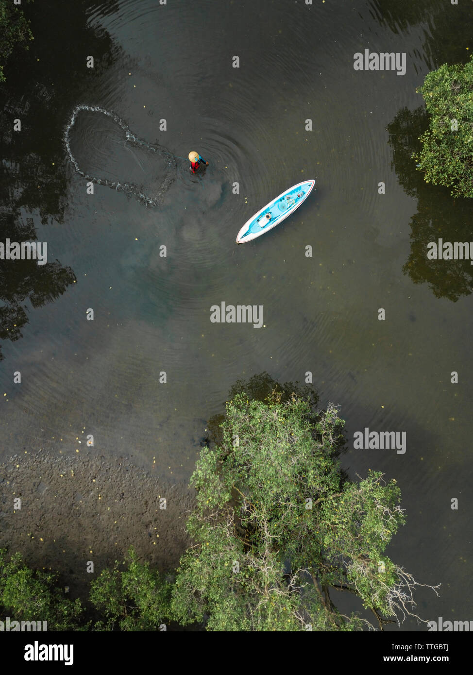 Fisherman with net Stock Photo Alamy