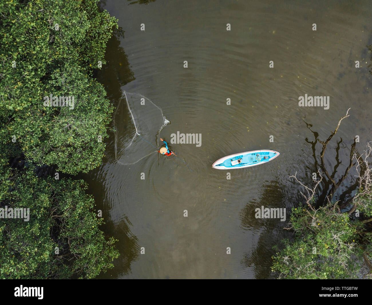 Fisherman with net Stock Photo Alamy
