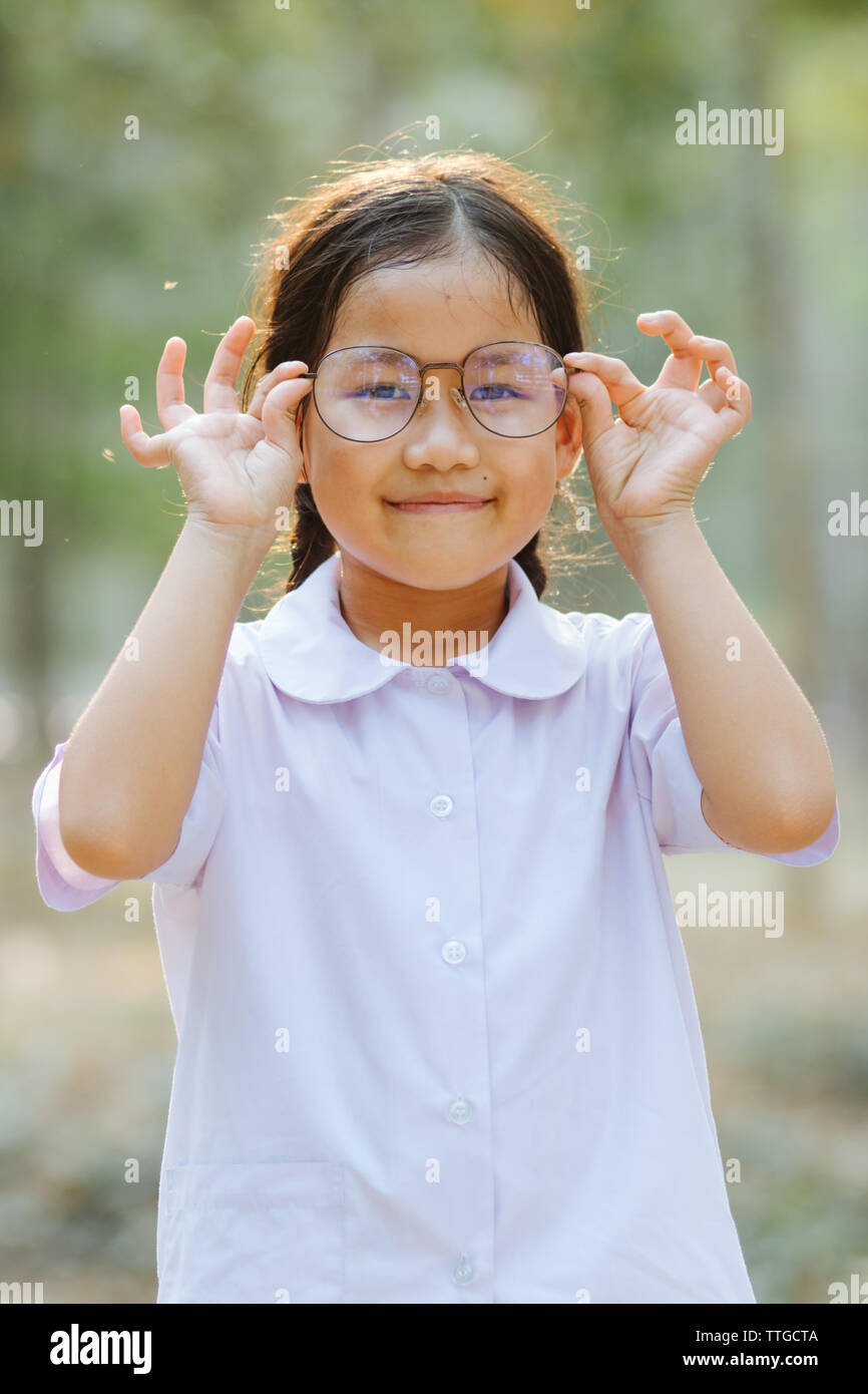 Girl wears eyeglasses Stock Photo