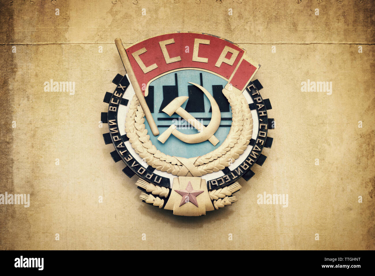 Soviet union CCCP emblem with hammer and sickle on a wall Stock Photo