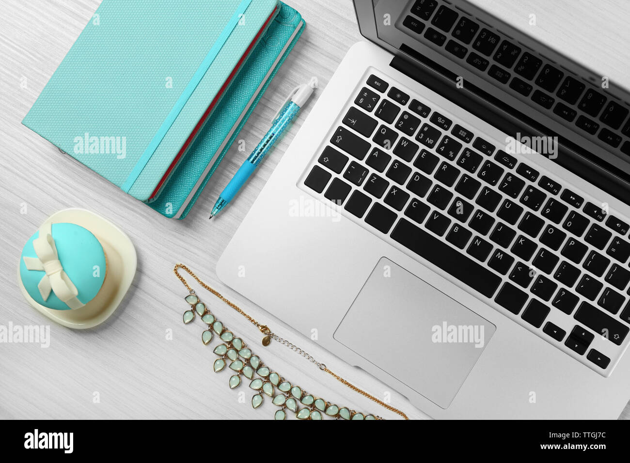 Laptop with woman's accessories on white wooden table background Stock ...