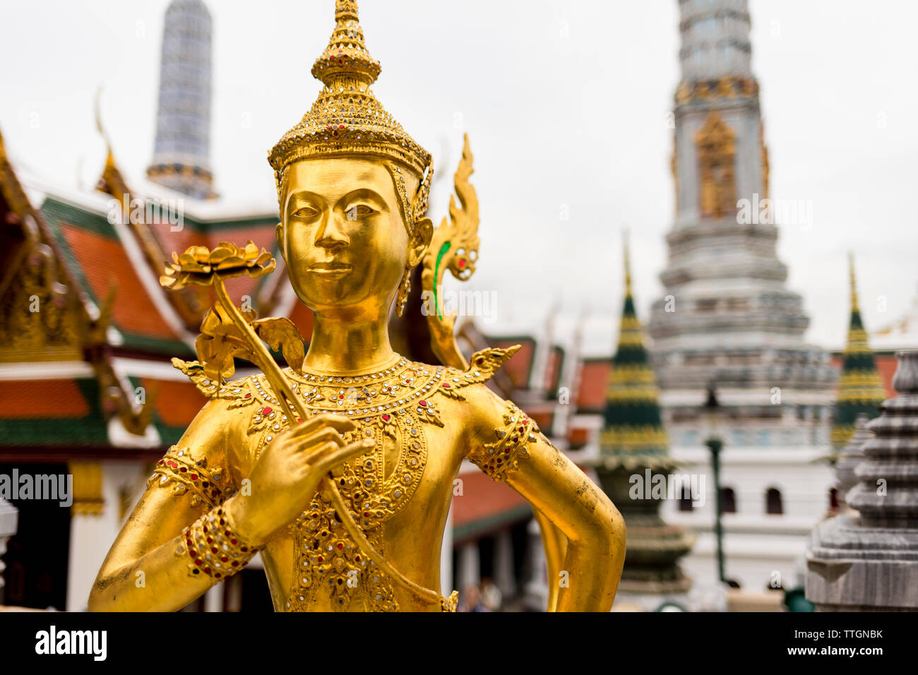 Golden statue at the Grand Palace in Bangkok, Thailand Stock Photo - Alamy