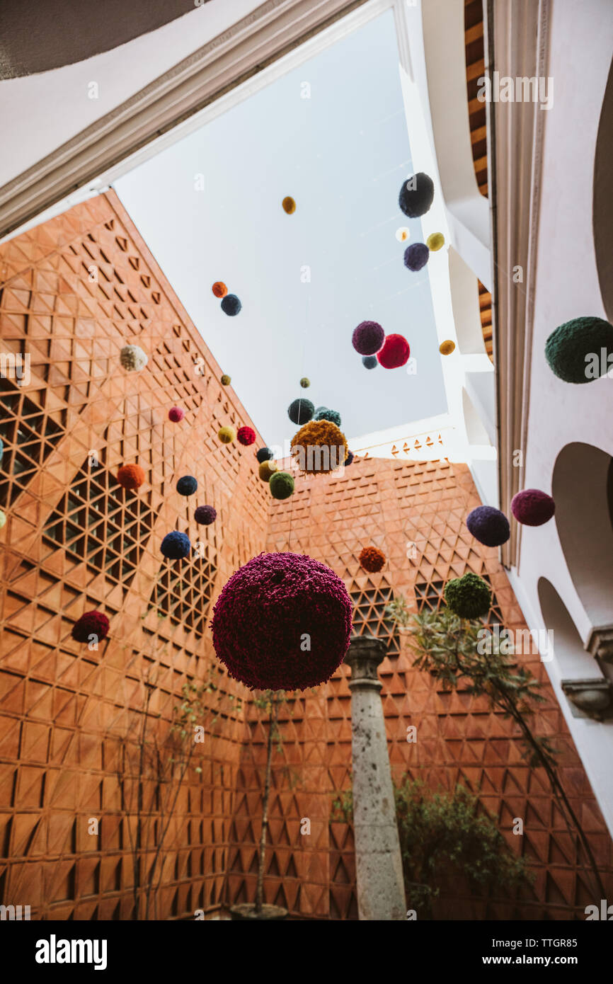 open air art installation of knit yarn balls in oaxaca city mexico Stock Photo