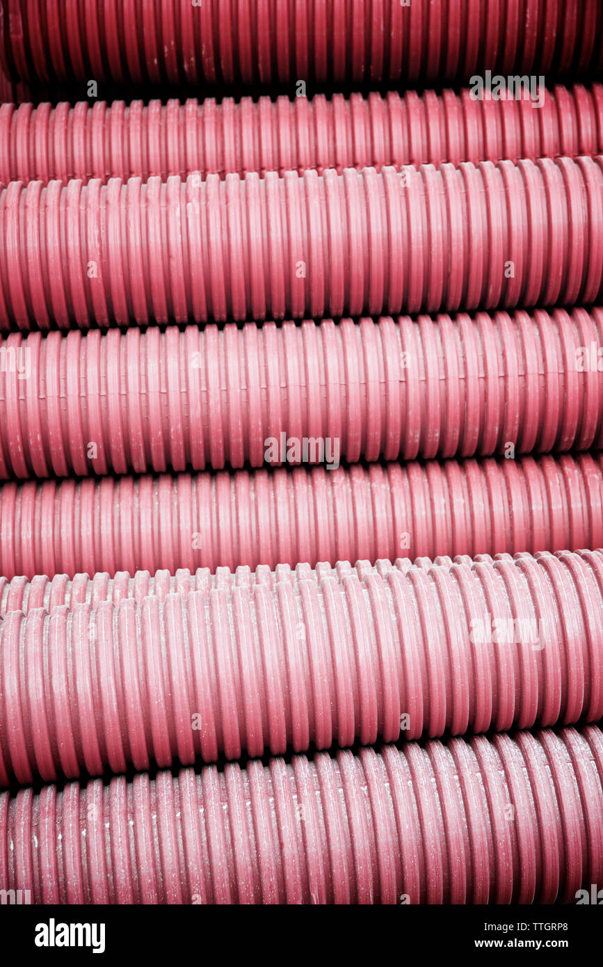 Closeup of red corrugated plastic pipes Stock Photo Alamy
