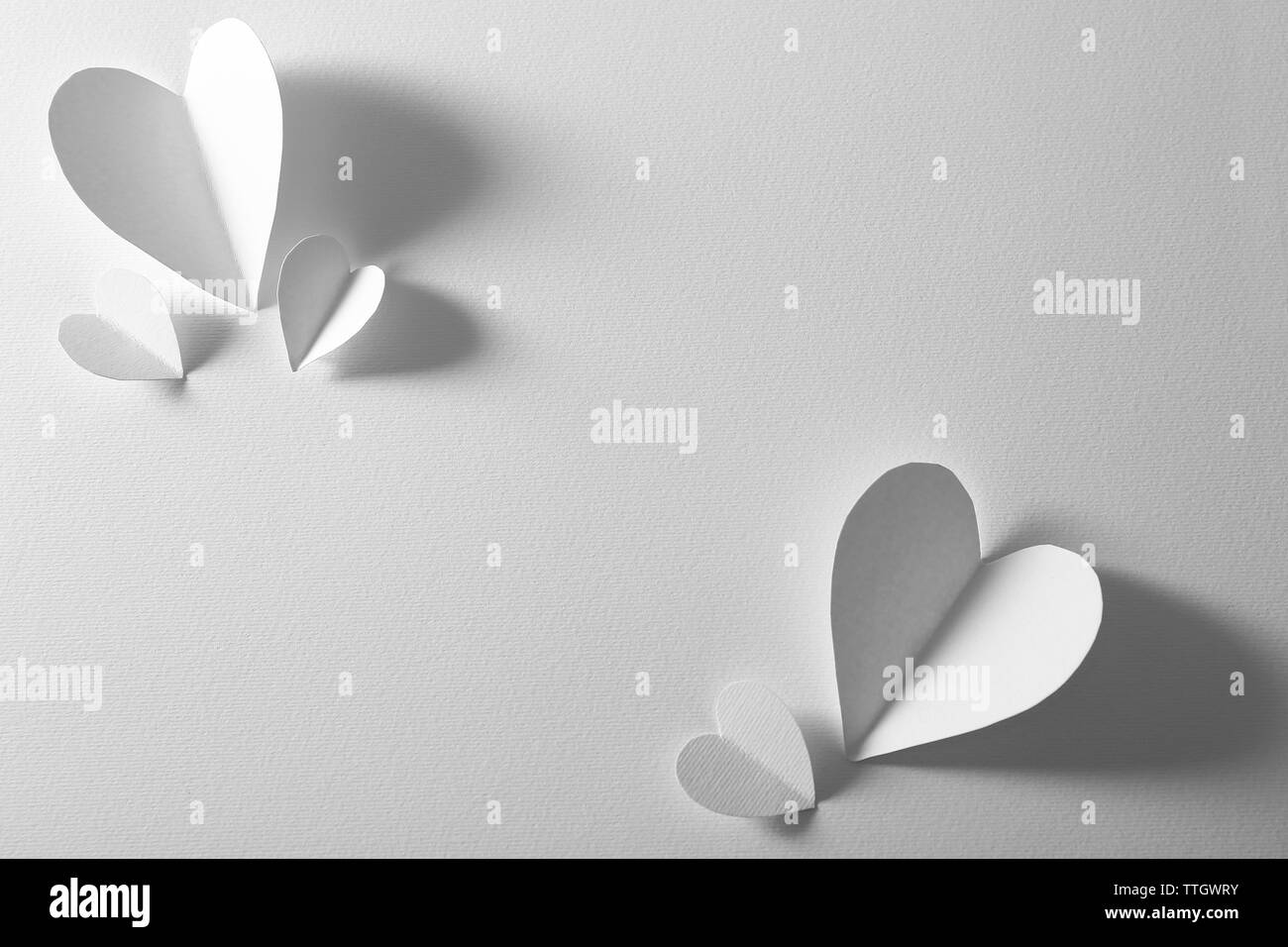 Beautiful paper hearts on white background Stock Photo Alamy