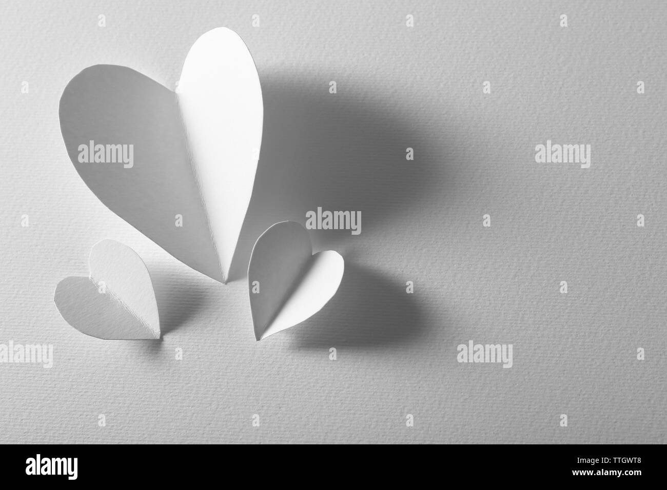 Beautiful paper hearts on white background Stock Photo Alamy
