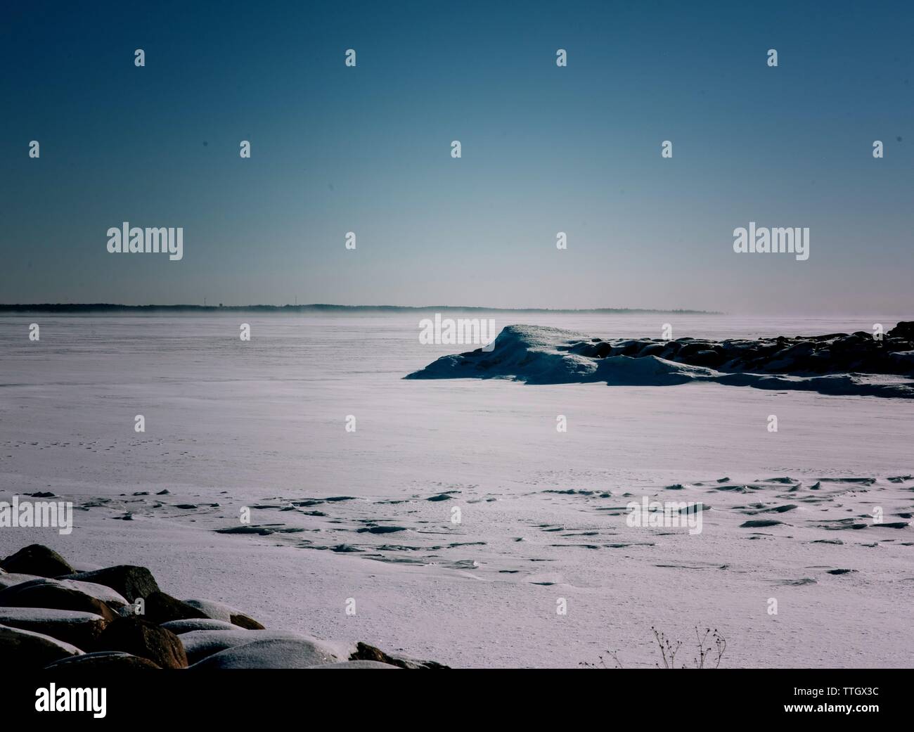 Lake Simcoe frozen lake cold weather covered in snow Stock Photo