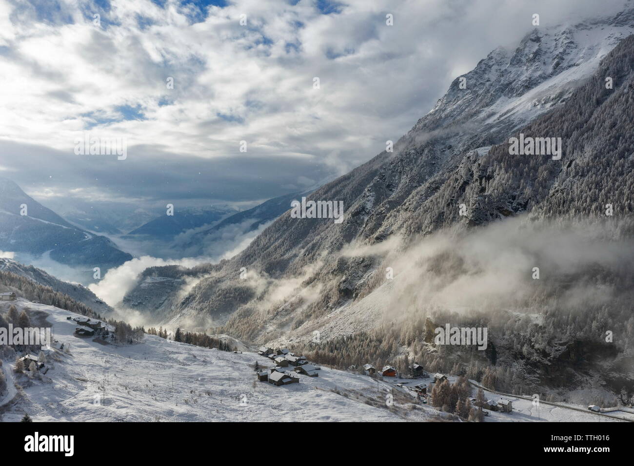 Village Of San Giuseppe After A Snowfall, Valmalenco, Italy Stock Photo 