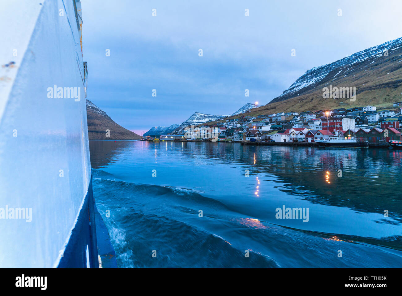 Coastal village of Klaksvik from ferry, Bordoy, Faroe Islands Stock Photo