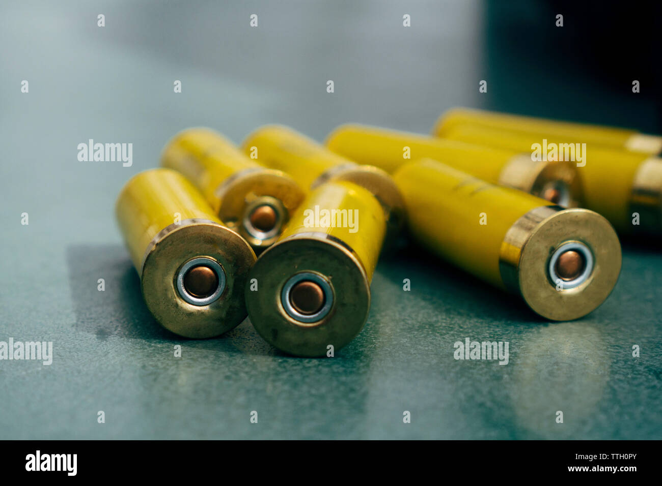 Close-up of shotgun shells on table Stock Photo