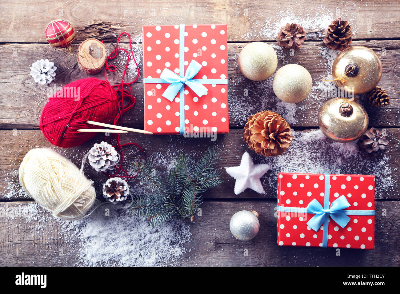 Christmas composition with gift box and decorations on a wooden table ...