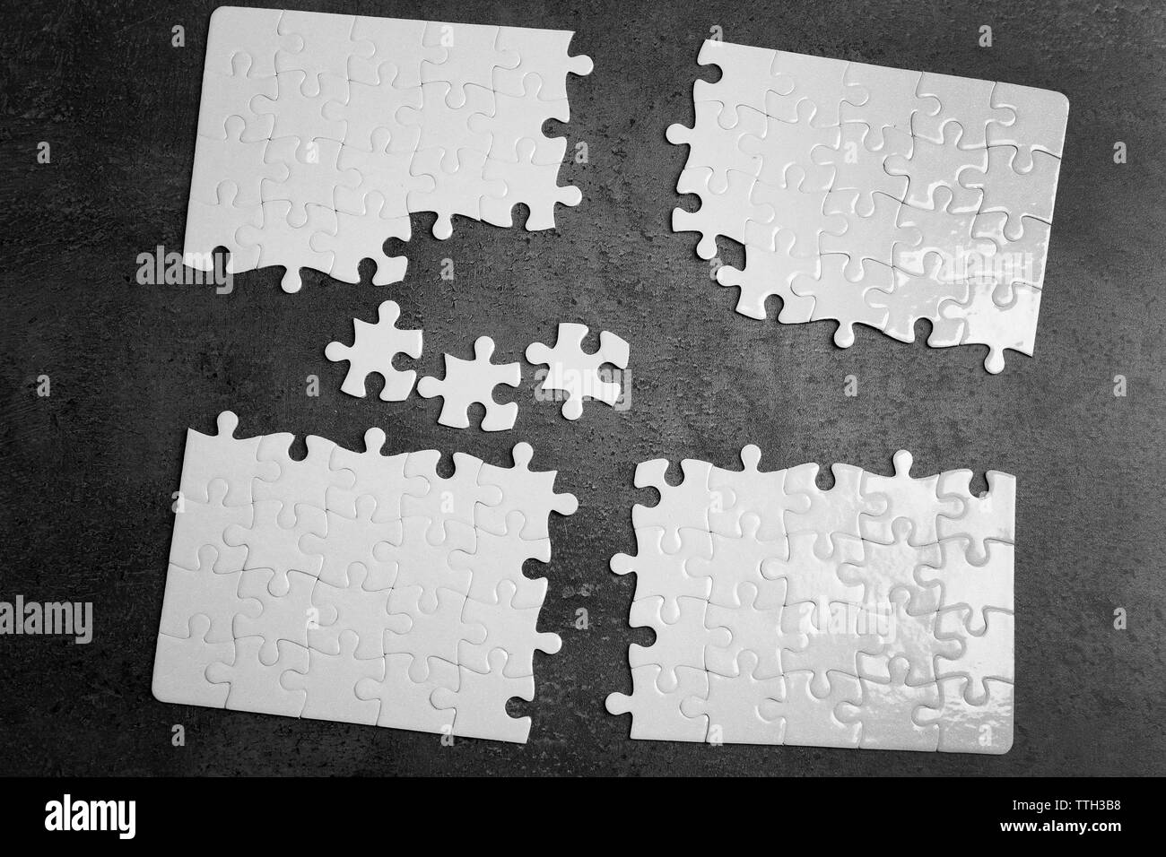 Blank jigsaw puzzle pieces Black and White Stock Photos & Images - Alamy
