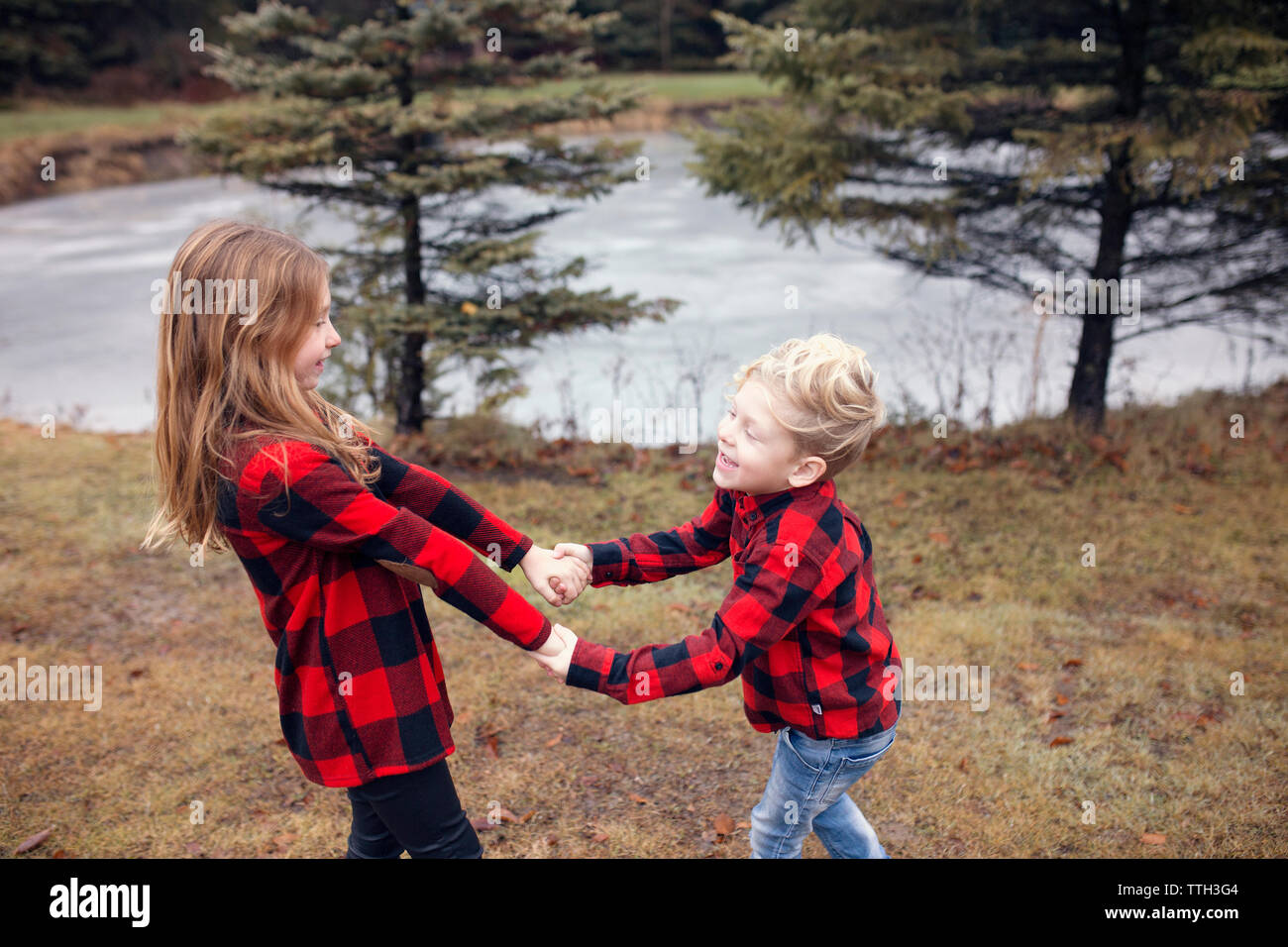Family in Matching Red Plaid Stock Photo - Alamy