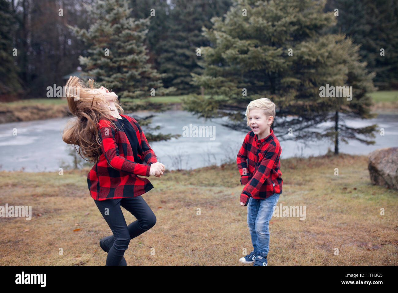 Family in Matching Red Plaid Stock Photo