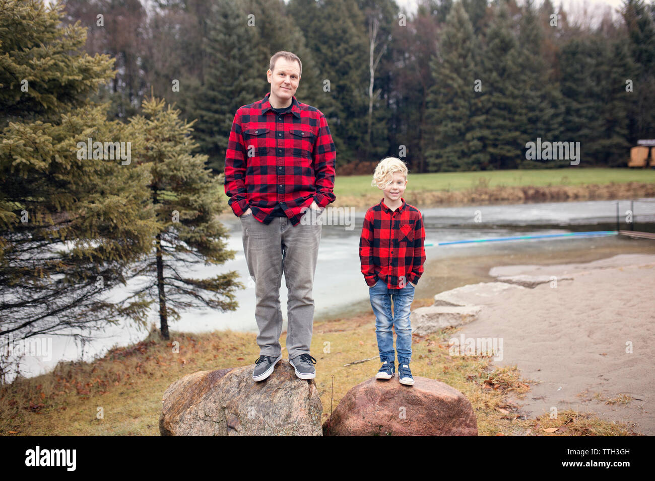 Family in Matching Red Plaid Stock Photo - Alamy