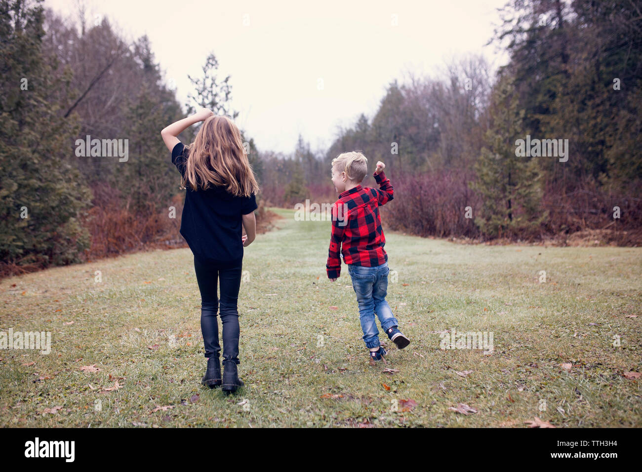 Family in Matching Red Plaid Stock Photo - Alamy