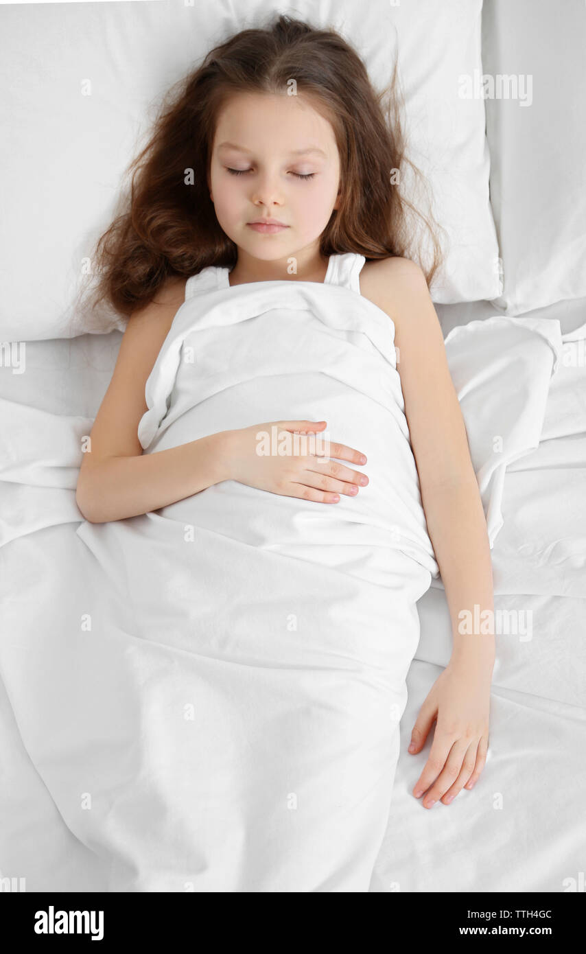 Little girl sleeping in bed Stock Photo Alamy