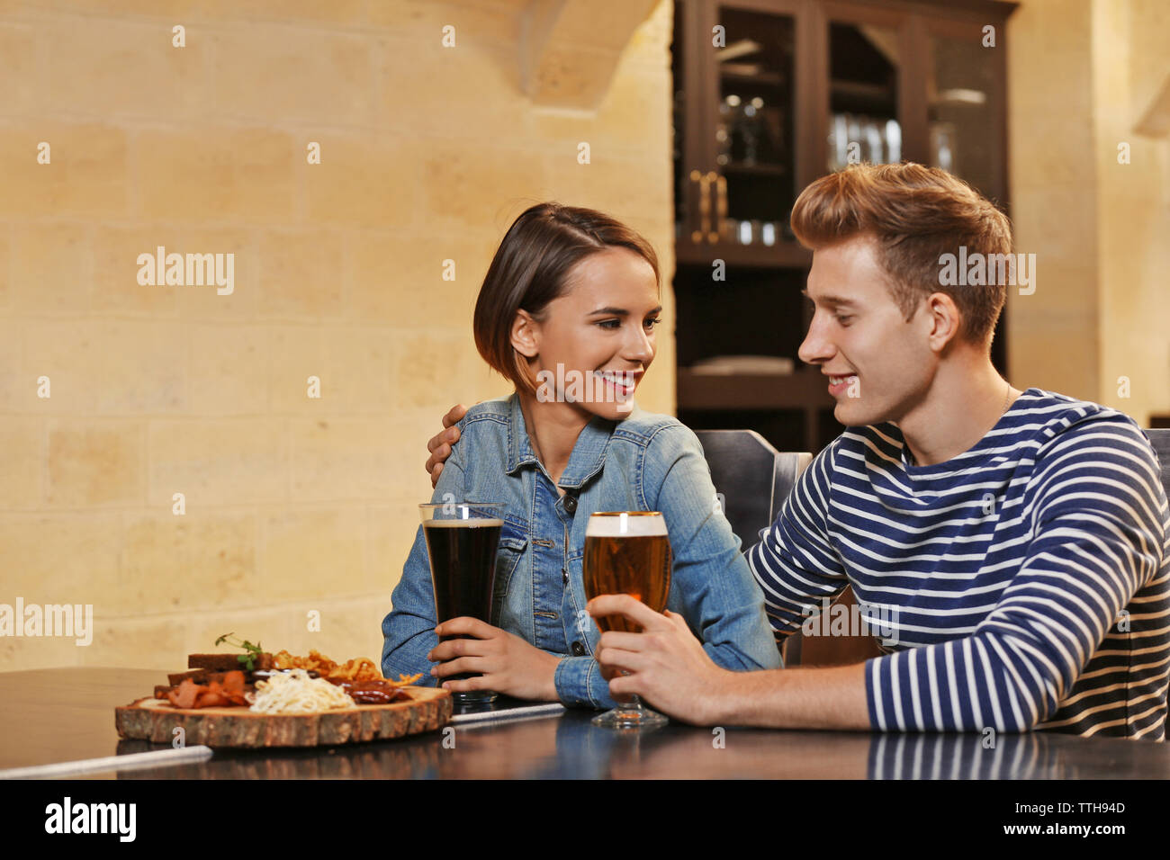 Bar Spend Two young people spending time in bar Stock Photo - Alamy