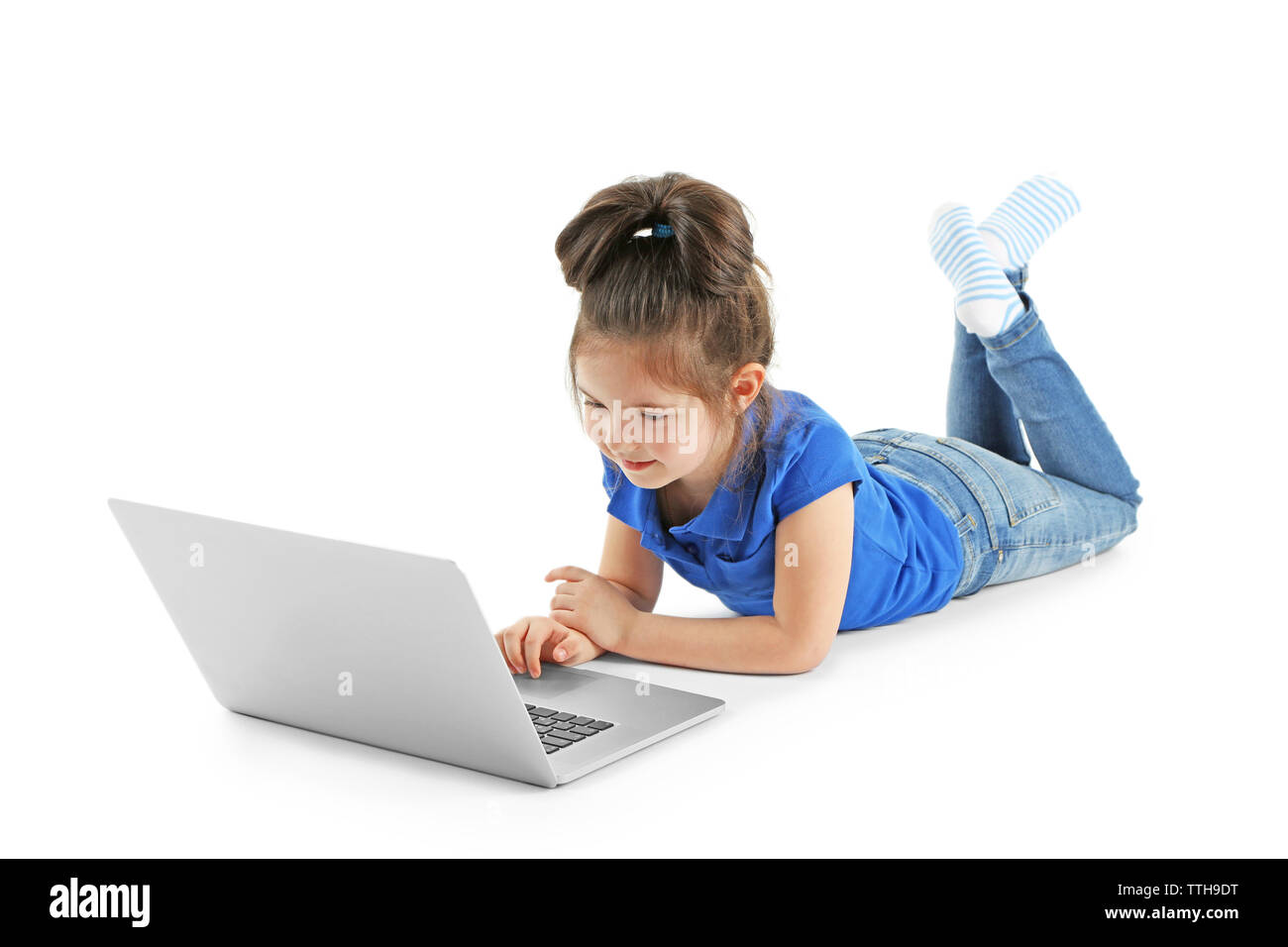 Little girl with laptop isolated on white Stock Photo - Alamy