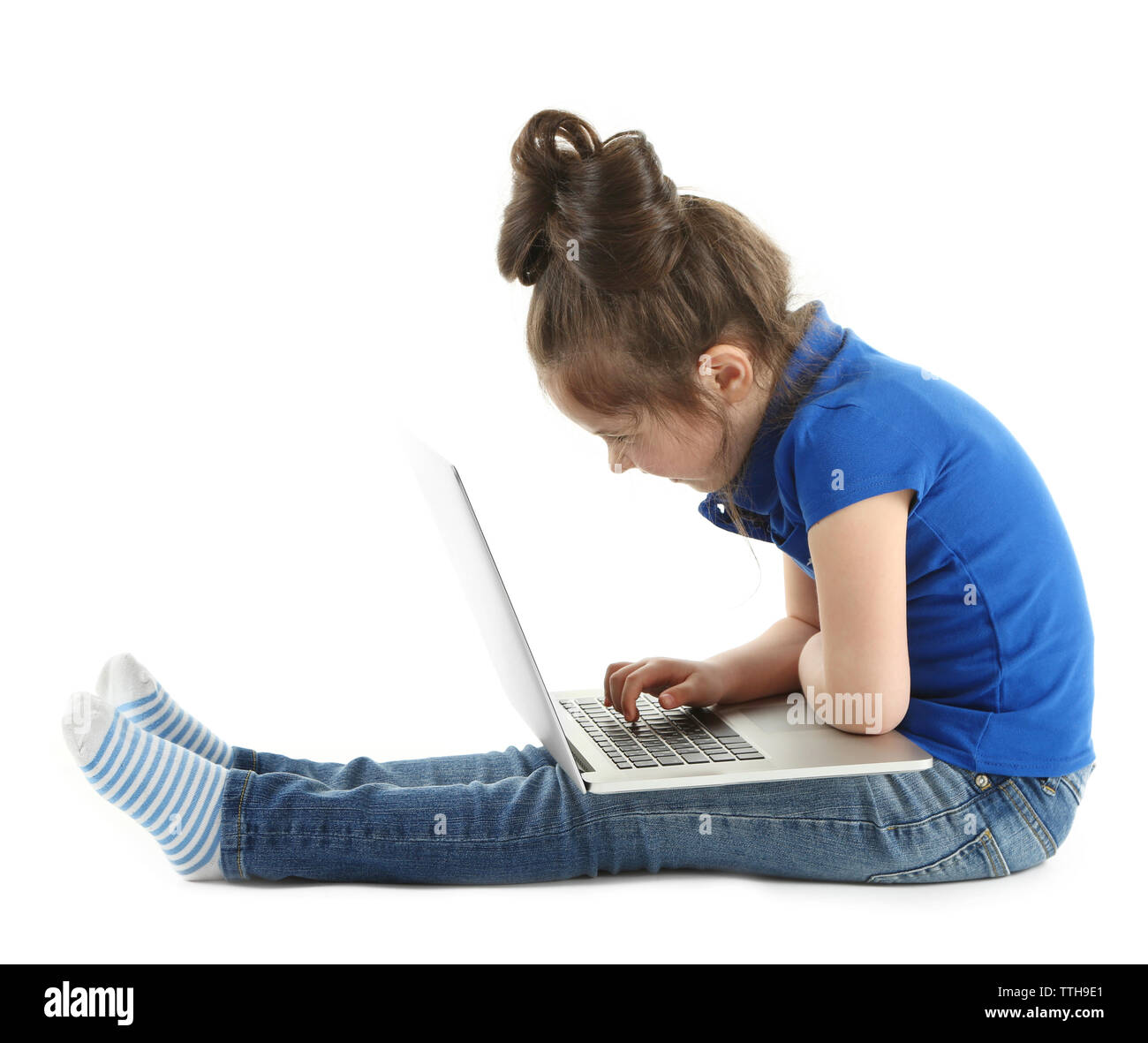Little girl with laptop isolated on white Stock Photo - Alamy