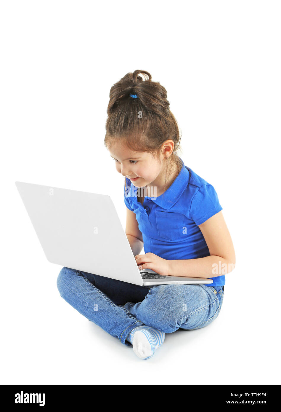 Little girl with laptop isolated on white Stock Photo - Alamy