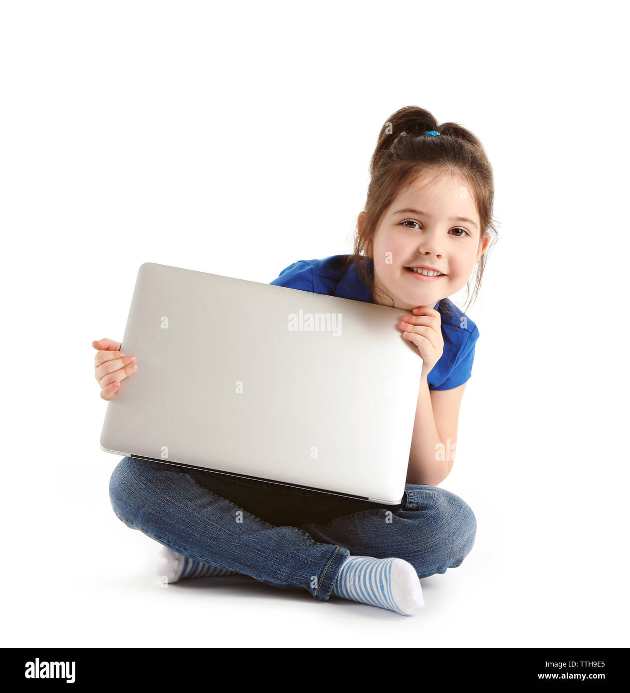 Little girl with laptop isolated on white Stock Photo - Alamy