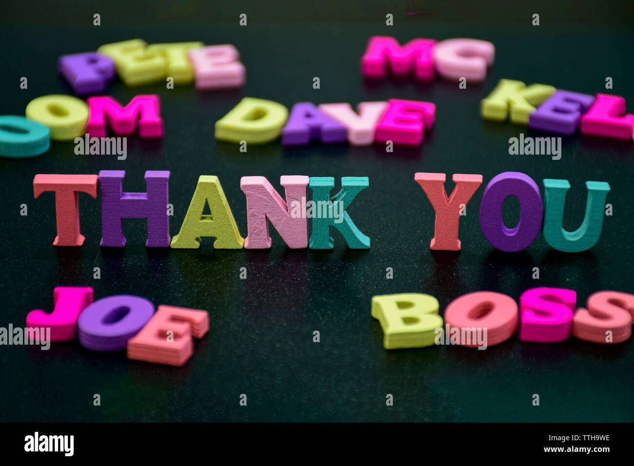 Thank you word on dark background Stock Photo - Alamy