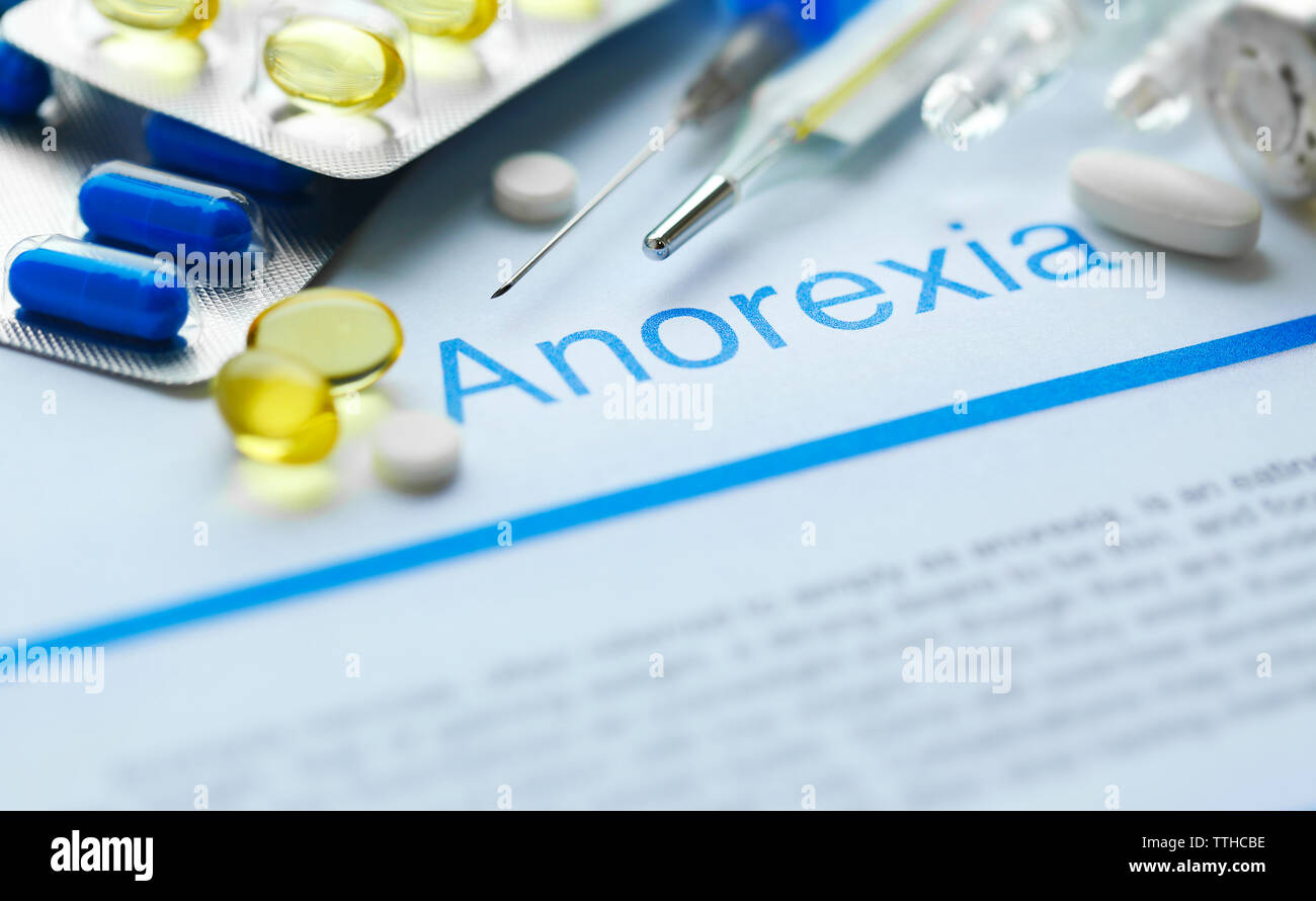 Medicines And Anorexia Diagnosis Written On Paper Closeup Stock Photo ...