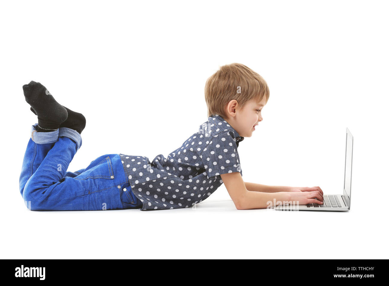 Little boy using laptop isolated on white Stock Photo - Alamy