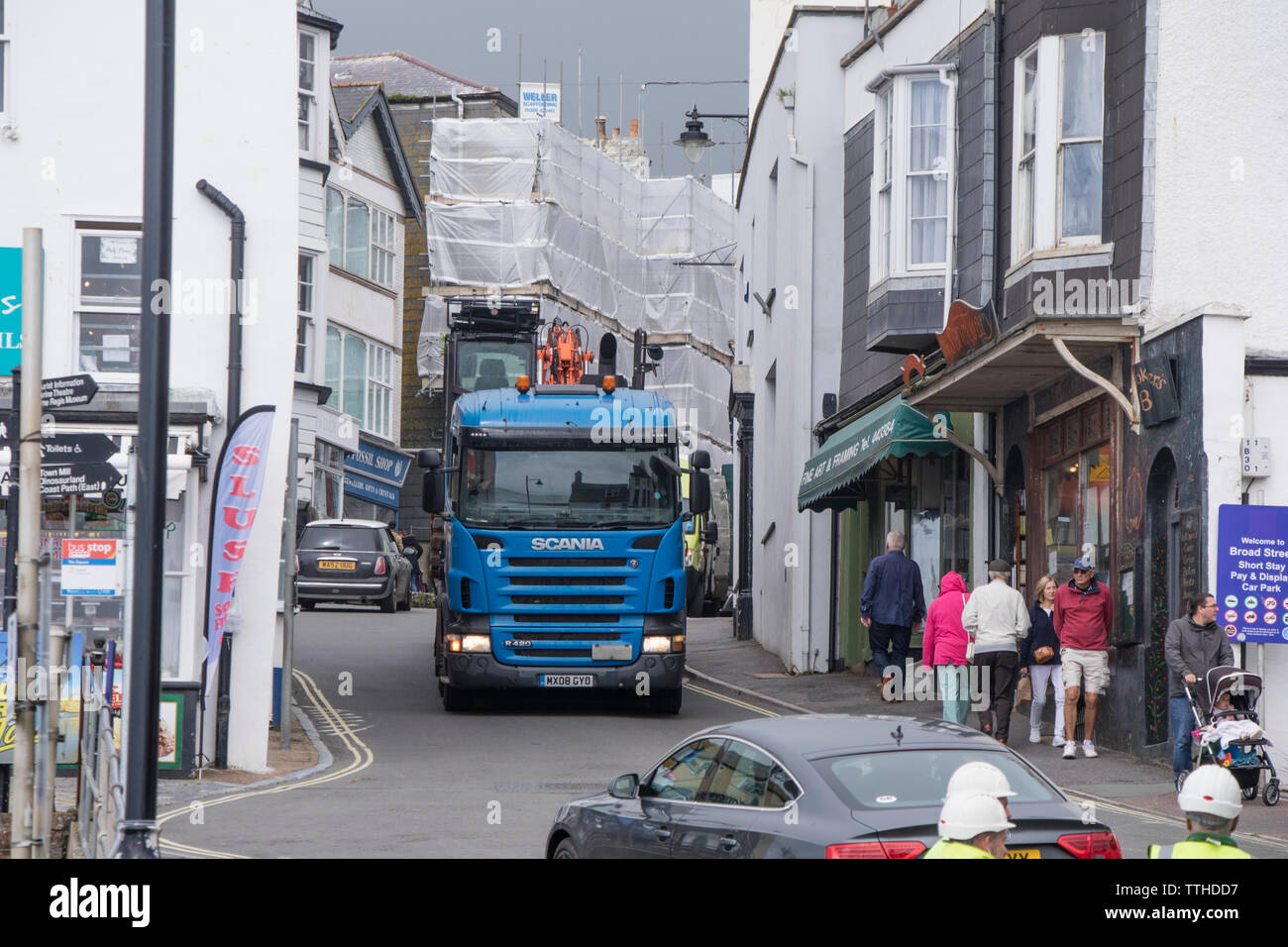 Heavy vehicles in the narrow streets of Lyme Regis, Dorset, England, UK Stock Photo