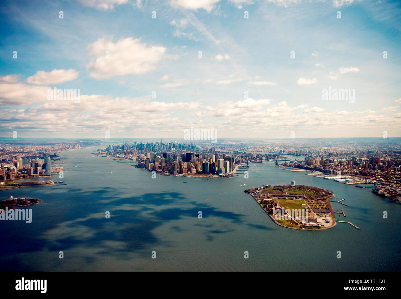 Aerial view of rivers and cityscape against sky Stock Photo - Alamy
