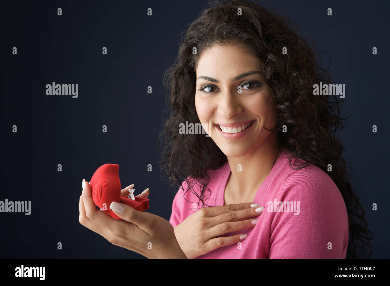 Portrait of a woman a ring in a box and smiling Stock Photo - Alamy